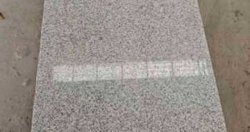 那曲芝麻白光面毛板