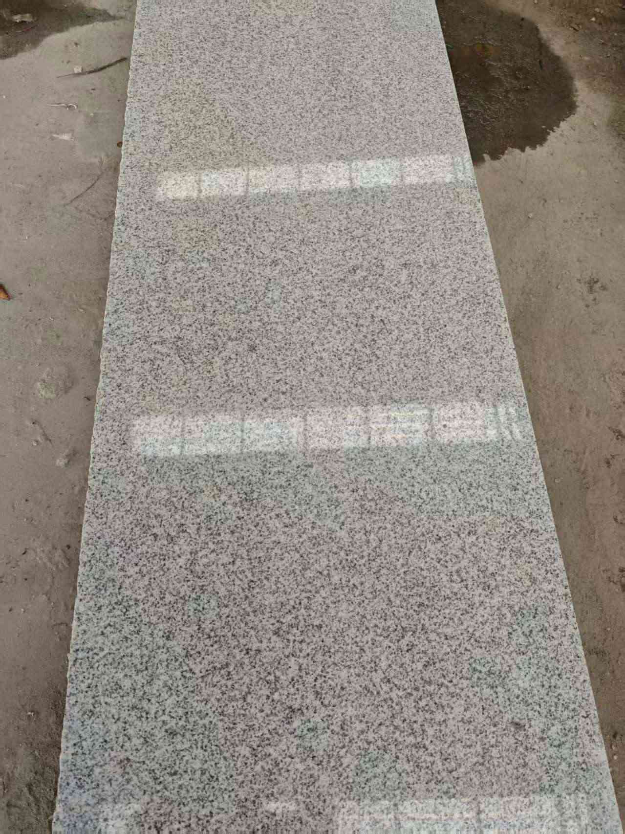 那曲芝麻白光面毛板